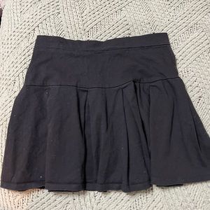 Black pleated mini tennis skirt. Great condition, size XL (fits like a M)